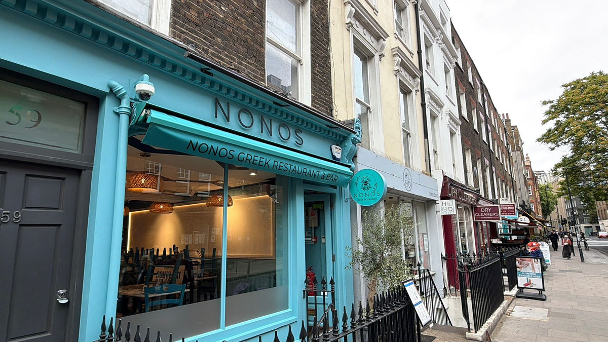 The teal Nonòs shopfront at street level on Judd Street